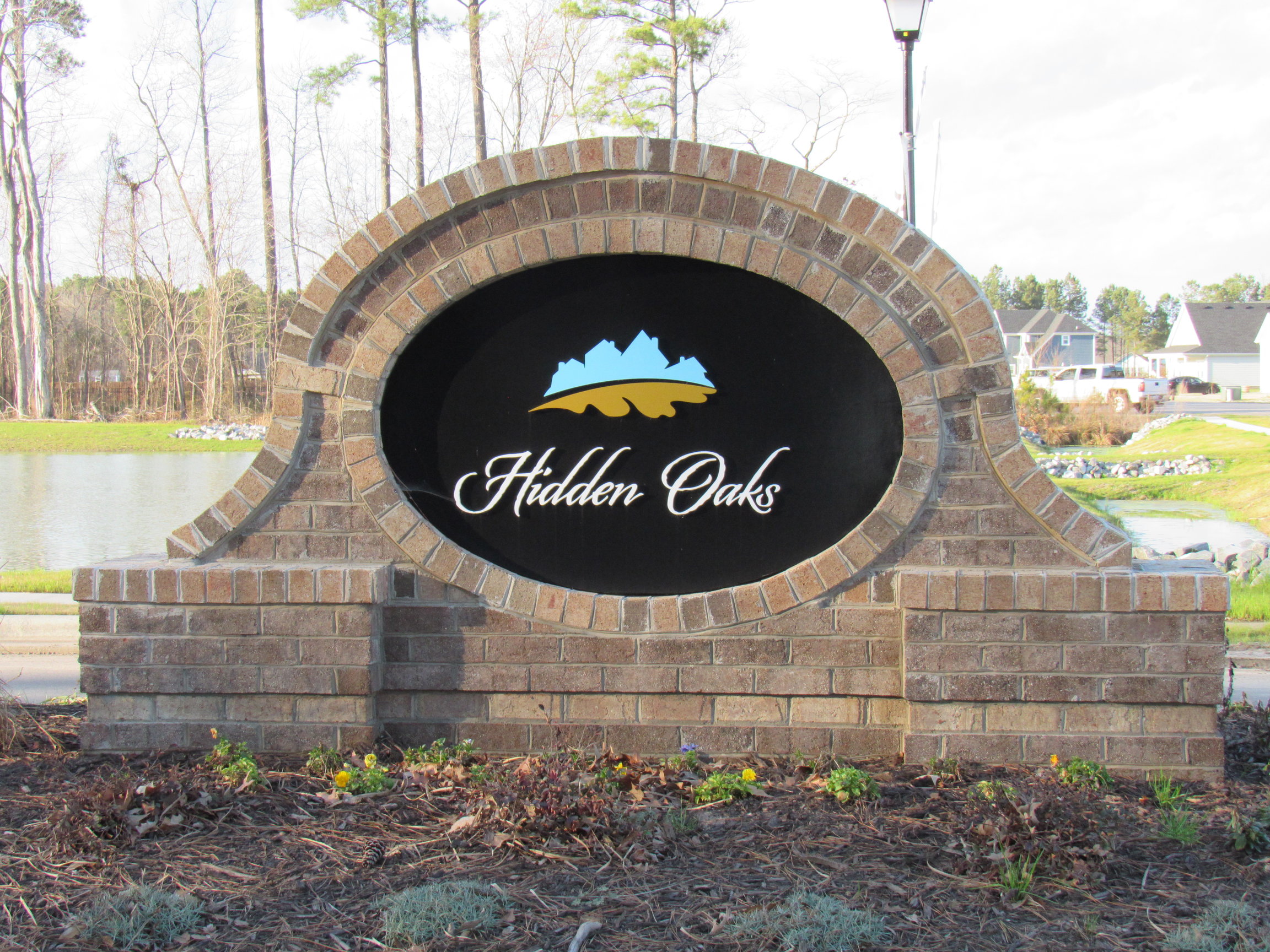 Hidden Oaks Community sign at subdivision